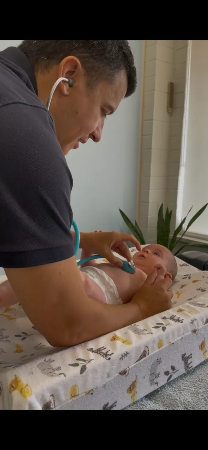 Gentle infant examination with a stethoscope